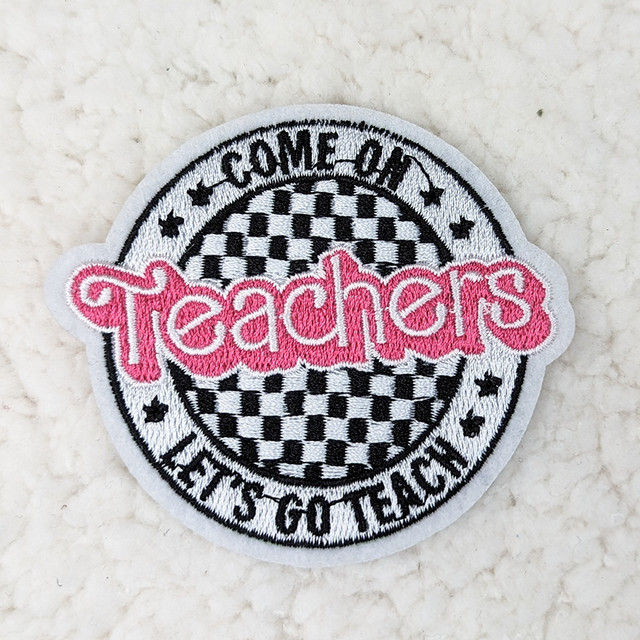 Come On Teachers Embroidered HAT/POCKET Patch, circular patch with black and white checkered pattern and pink embroidered 'Teachers' text.