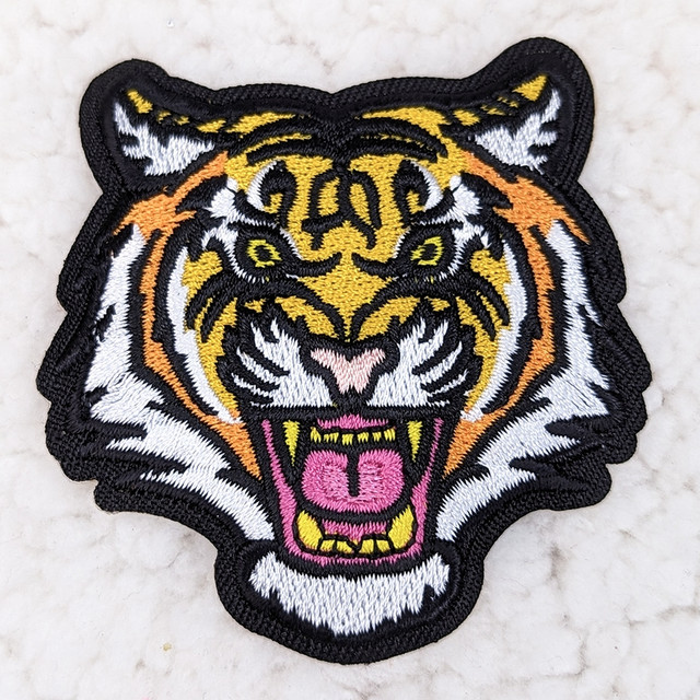 Tiger Mascot Embroidered HAT/POCKET Patch, detailed embroidered patch featuring a fierce tiger's face with vibrant colors.