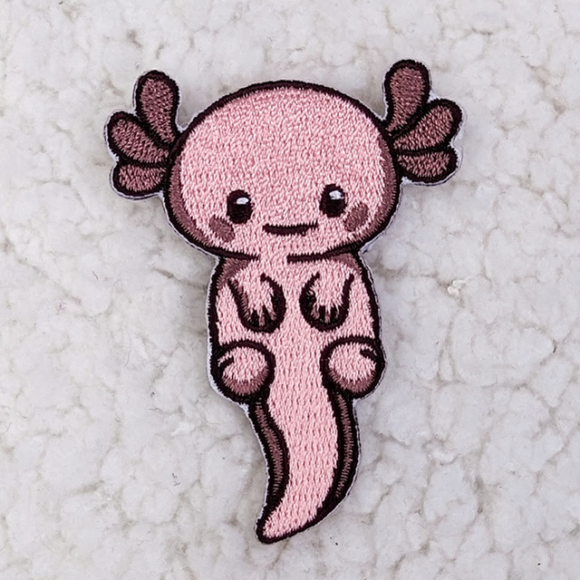 Axolotl Embroidered Hat/Pocket Patch, cute pink axolotl embroidered patch with detailed stitching and adorable facial expression.
