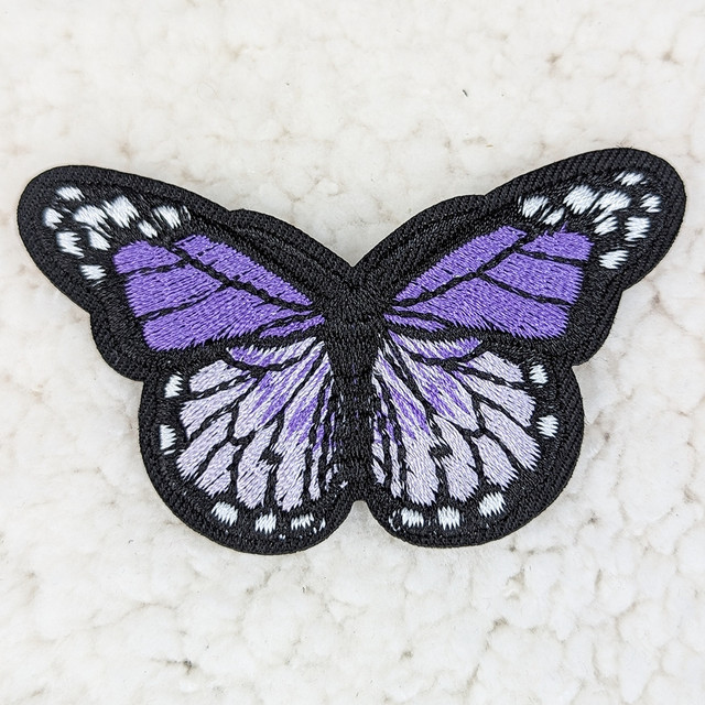 Purple Butterfly Embroidered HAT/POCKET Patch, detailed embroidered butterfly patch with purple wings and black outlining.