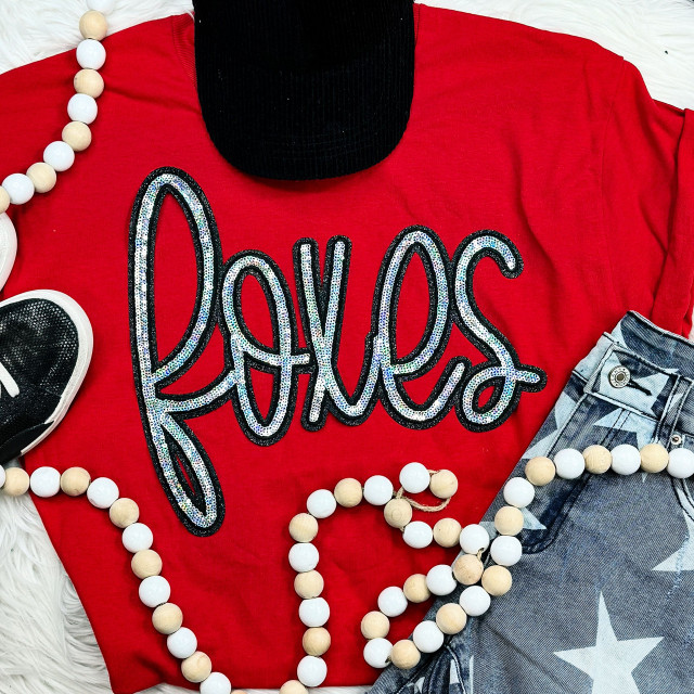 Foxes Sequin Patch, colorful embroidered fox design embellished with shiny sequins on red fabric.