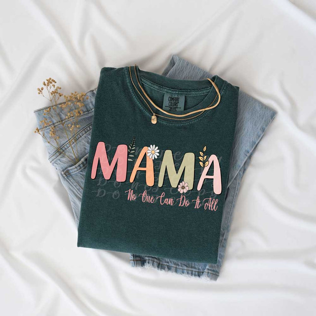 Mama No One Can Do It All Boho DTF Heat Transfer, floral graphic on dark teal t-shirt with pastel-colored lettering and decorative flowers.
