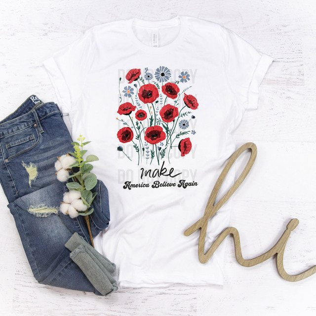 Make America Believe Again Floral Sublimation Transfer, a white t-shirt with a colorful floral design and patriotic message.