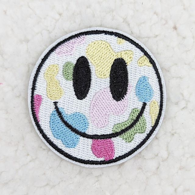 Painted Happy Face Embroidered HAT/POCKET Patch, colorful smiley face design with embroidered details.