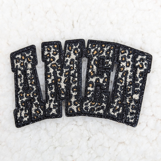 AMEN Leopard Embroidered Glitter HAT/POCKET Patch, black patch with intricate beige and white embroidery and glitter detailing.