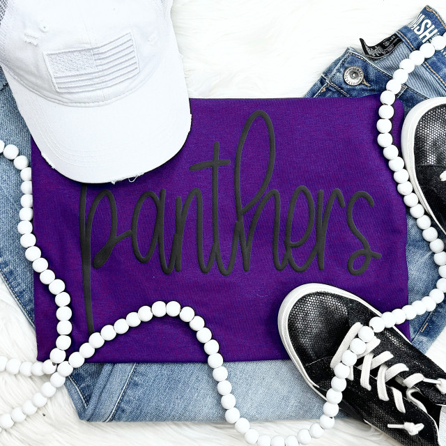 Panthers Black PUFF Screen Print Heat Transfer, black text design on purple fabric among casual accessories.