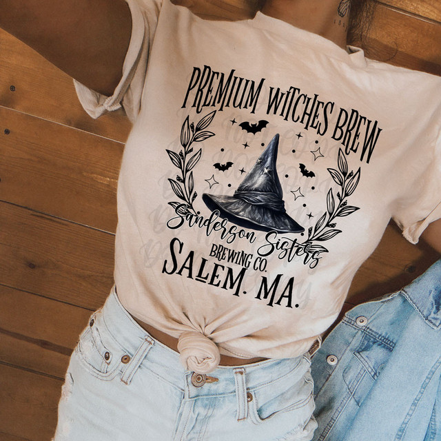Premium Witches Brew DTF Heat Transfer, a design featuring a witch's hat, bats, stars, and foliage for customizable apparel.