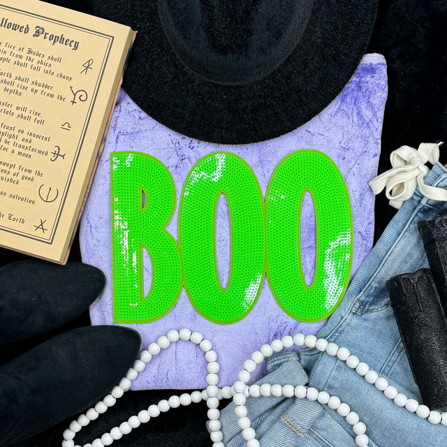 Neon Green BOO Sequin Patch, vibrant neon green sequin halloween patch spelling 'BOO' on purple fabric background.