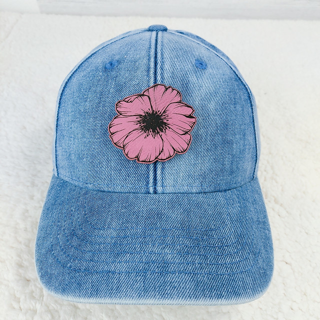 Wild Rose FAUX Leather Patch, blue denim baseball cap with pink floral embroidered patch.