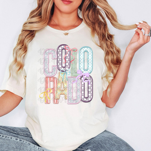 Colorado Coquette Faux Embroidery DTF Heat Transfer, colorful embroidered letter design on a white t-shirt.