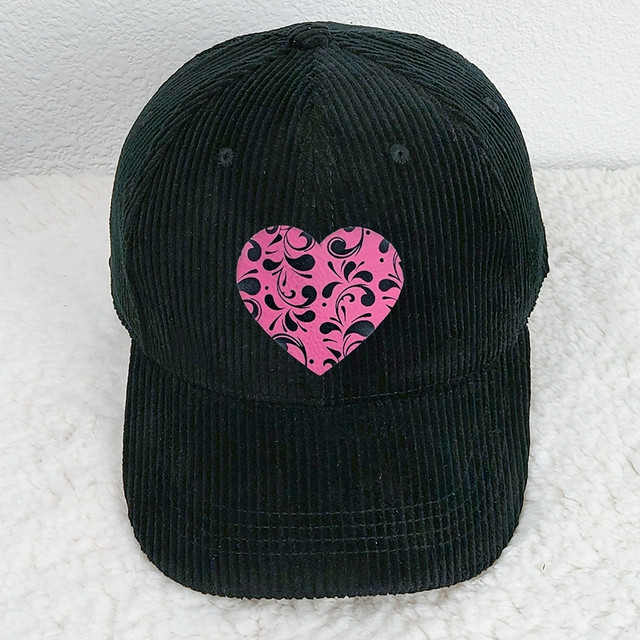 Swirl Heart FAUX Leather Patch, black corduroy baseball cap with pink heart-shaped leather patch featuring black swirl designs.