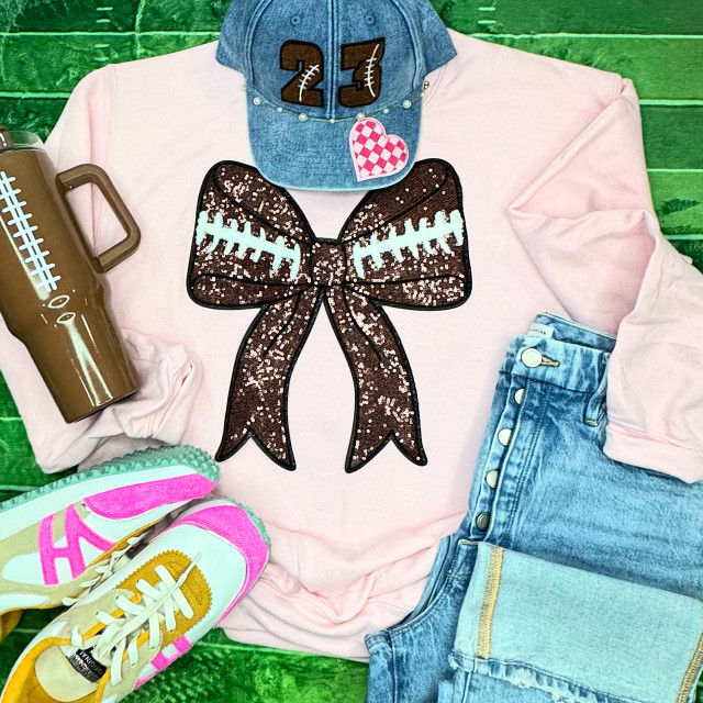 Sequins Football Bow Patch, a sparkly football-shaped bow with sequins embellishments.