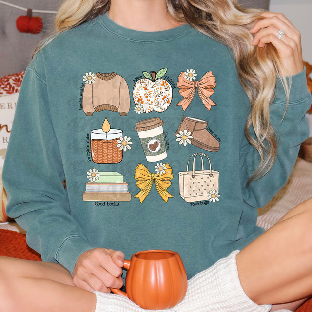 Fall Girly DTF Heat Transfer, printable design featuring autumn-themed icons like sweater weather, apple picking, bow, pumpkin spice candle, hot drinks, boots, good books, and tote bags, on a teal sweatshirt