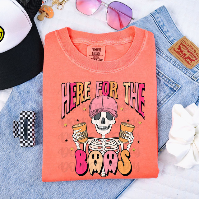 Here For The Boos Skeleton DTF Heat Transfer, colorful skeleton graphic with drinks on a pink t-shirt.