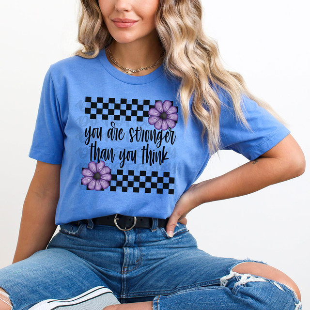You Are Stronger Than You Think Purple Flowers DTF Heat Transfer, purple flower design with motivational quote on a blue t-shirt.