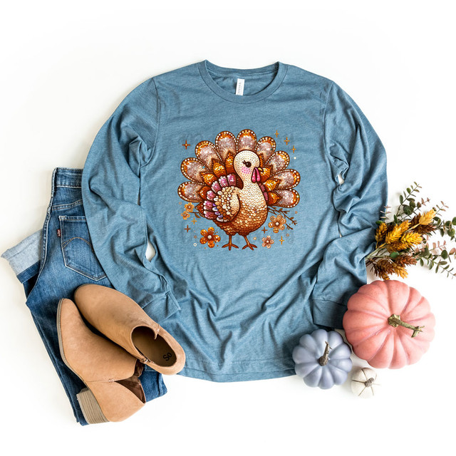 Faux Sequins Turkey DTF Heat Transfer, blue long sleeve shirt with a colorful, glittering turkey design for fall or Thanksgiving celebrations.