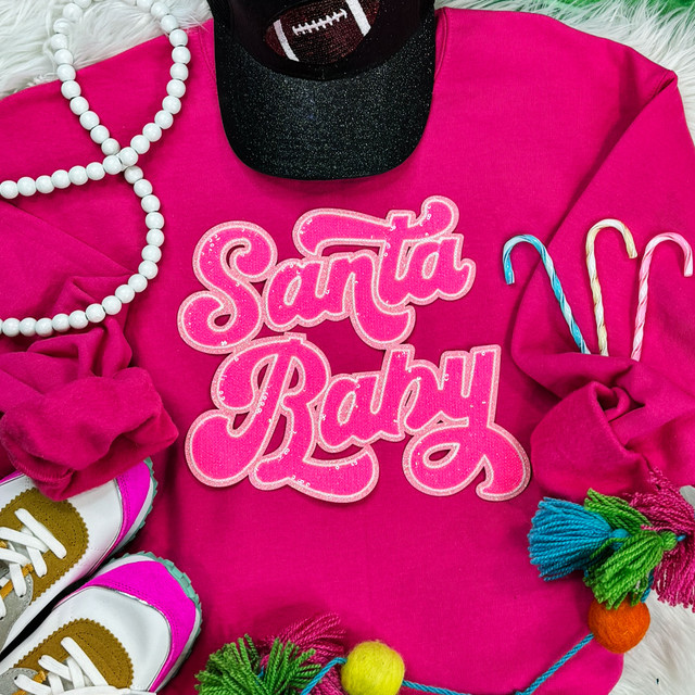 Santa Baby Sequin Patch, vibrant pink sequin embroidered patch with 'Santa Baby' text on pink clothing.