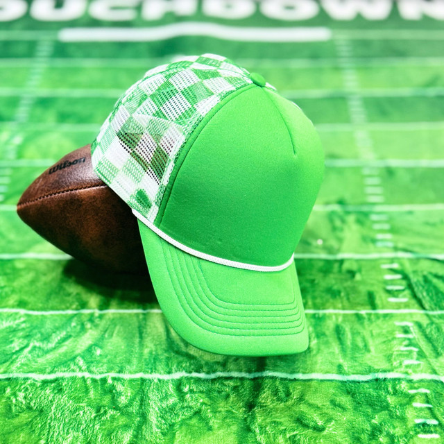 Kelly Green & White Checkered Foam Trucker Hat, stylish and sporty baseball cap with a checkered pattern on the back and a solid green front and brim.