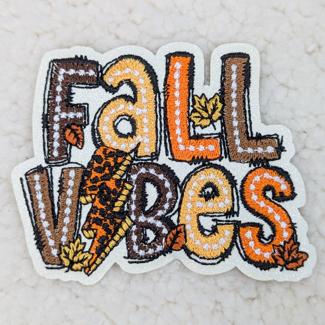 Fall Vibes Embroidered HAT/POCKET Patch, colorful autumn-themed embroidery with leaves, a leaf, and the words 'Fall Vibes' in vibrant fall colors.
