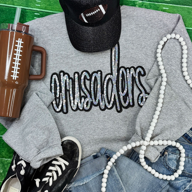 Crusaders Sequin Patch, decorative patch with silver and black sequins spelling 'crusaders' for clothing embellishment.