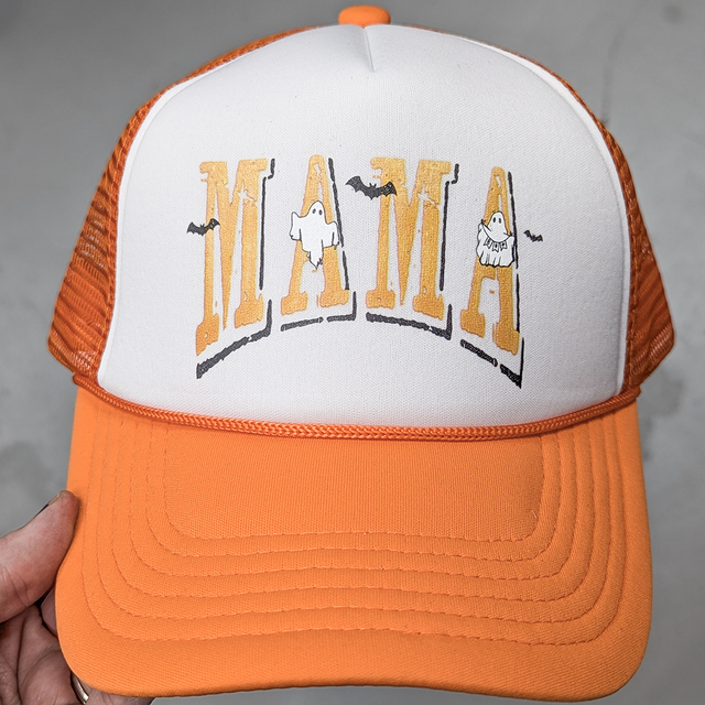 Mama Ghosts Hat/Pocket Screen Print Heat Transfer, orange and white trucker hat featuring Halloween-themed ghost and bat design with the word 'MAMA' in bold letters.