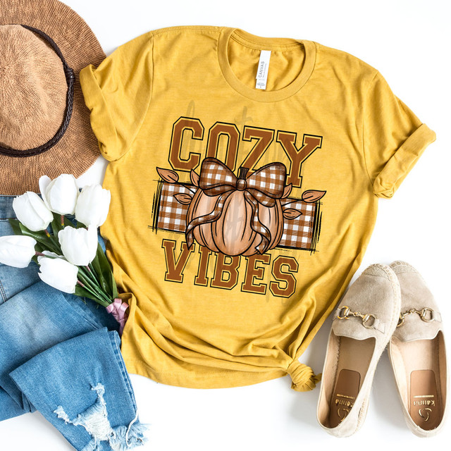 Cozy Vibes Plaid DTF Heat Transfer, yellow T-shirt with pumpkin and plaid bow design.