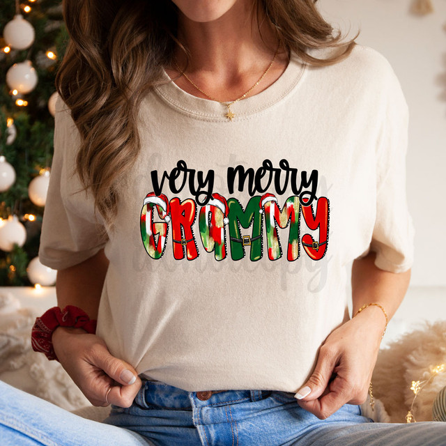 Very Merry Grammy DTF Heat Transfer, Christmas-themed graphic on beige sweatshirt with holiday cheer design.
