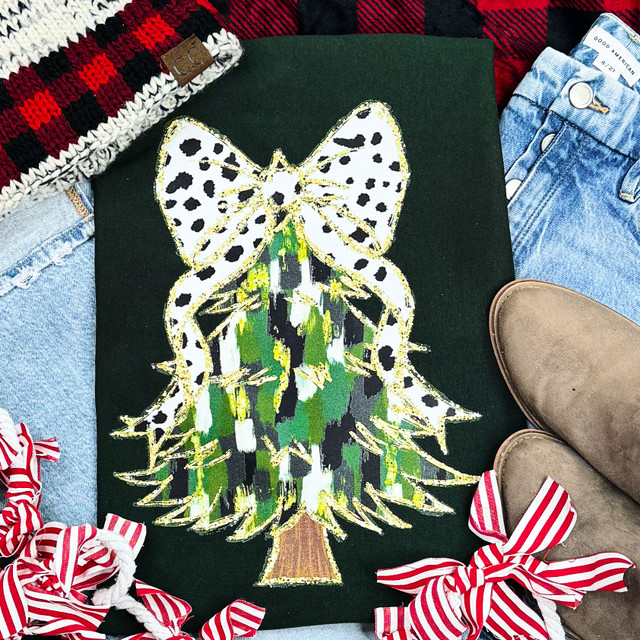 Brush Stroke Tree White Bow Screen Print Heat Transfer, colorful artistic design of a tree with a white bow on top, applied to a black fabric surface.