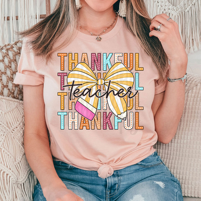Thankul Teacher Pencil Bow DTF Heat Transfer, colorful thank you teacher design with a large yellow striped bow and a pink eraser detail.