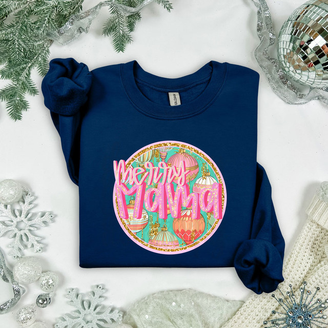 Merry Mama Ornaments Faux Glitter DTF Heat Transfer, festive Christmas shirt design with pink text and colorful ornament graphics on a navy blue t-shirt.