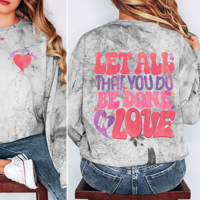 Let All That You Do Be Done In Love SET DTF Heat Transfer, image of a sweatshirt with colorful text and design on both front and back.