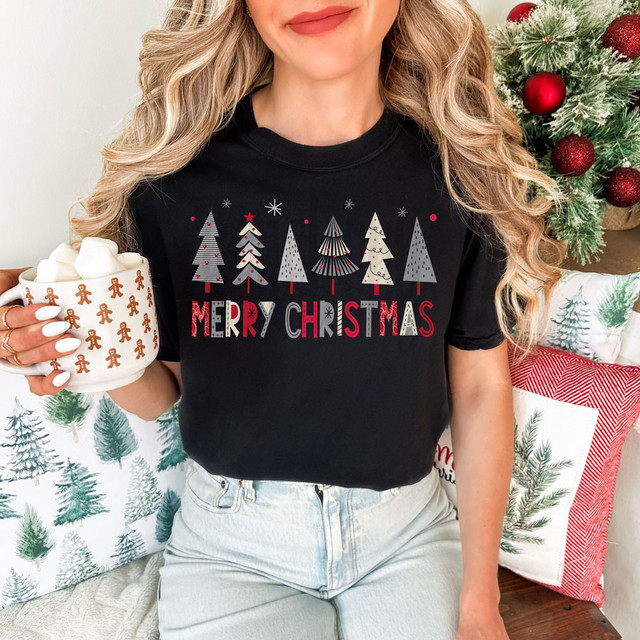 Merry Christmas Trees DTF Heat Transfer, festive holiday T-shirt featuring colorful Christmas tree designs and Merry Christmas text.