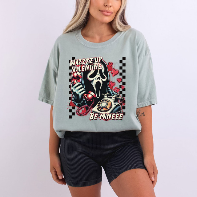 Wazzz Up Valentine Be Mineee DTF Heat Transfer, graphic t-shirt design featuring a ghostly figure with a rotary phone and love hearts.