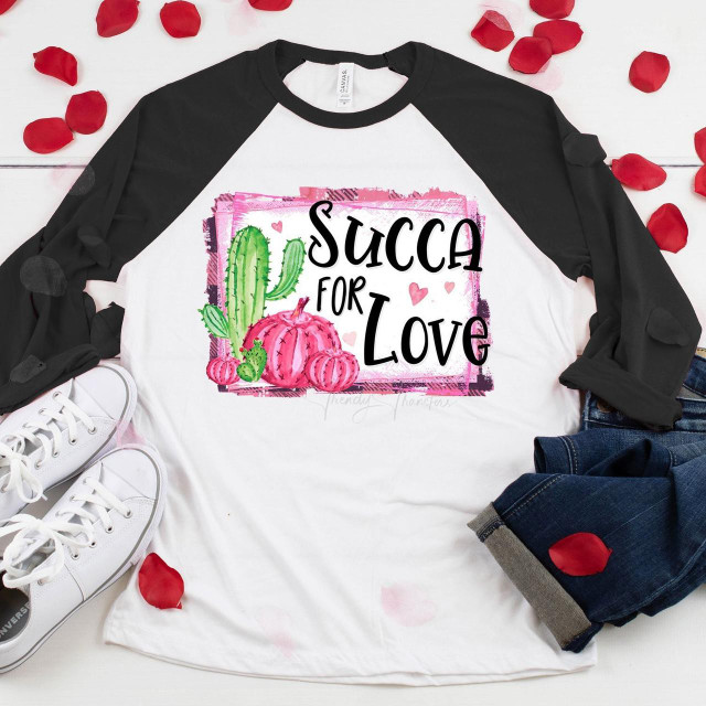 Succa For Love Sublimation Transfer, colorful cute cactus and pumpkin design on a white and black long sleeve shirt with pink and red hearts.