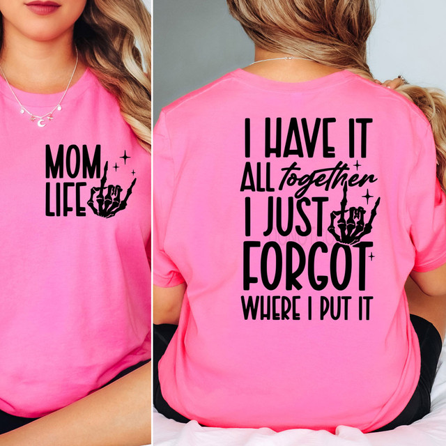 I Have It All Together I Just Forgot Where I Put It Mom Life SET DTF Heat Transfer, pink t-shirt with black text and skeleton hand graphic on front and back.