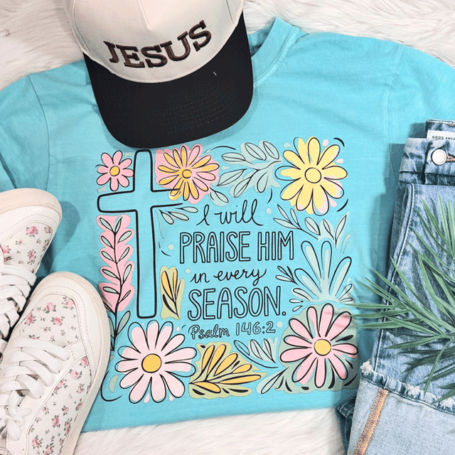 Product I Will Praise Him CLEAR Screen Print Heat Transfer, colorful religious graphic with flowers, cross, and Bible verse from Psalm 146:2 on a light blue t-shirt.