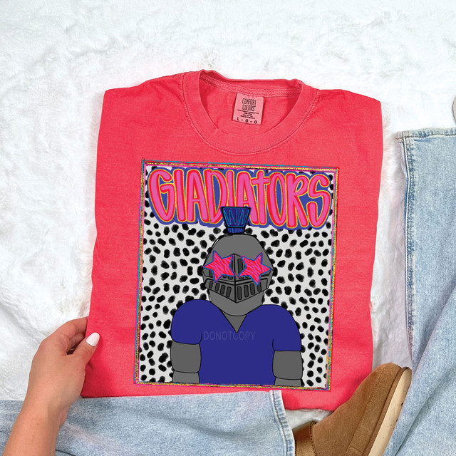Gladiators Colorful Mascot DTF Heat Transfer, vibrant and colorful mascot design featuring a gladiator with star-shaped sunglasses on a pink T-shirt.