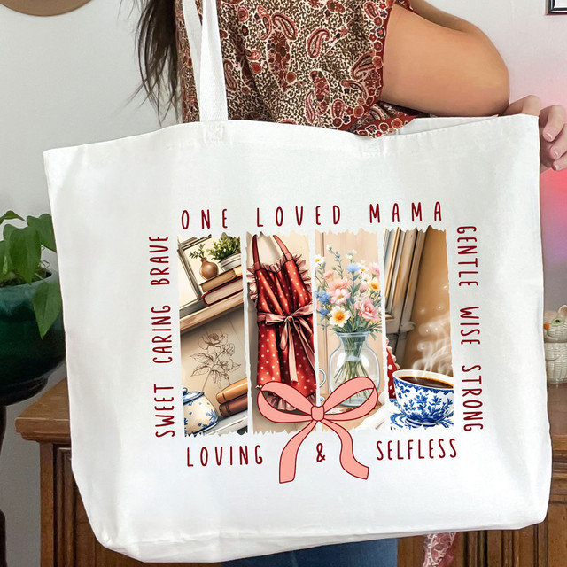 One Loved Mama With Bow DTF Heat Transfer, decorative tote bag with inspirational quote and floral design for Mother's Day or gift-giving.