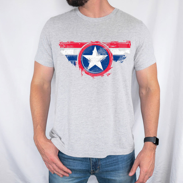 Captain's Shield DTF Heat Transfer, graphic design of a distressed patriotic star emblem with red, white, and blue colors on a gray T-shirt.