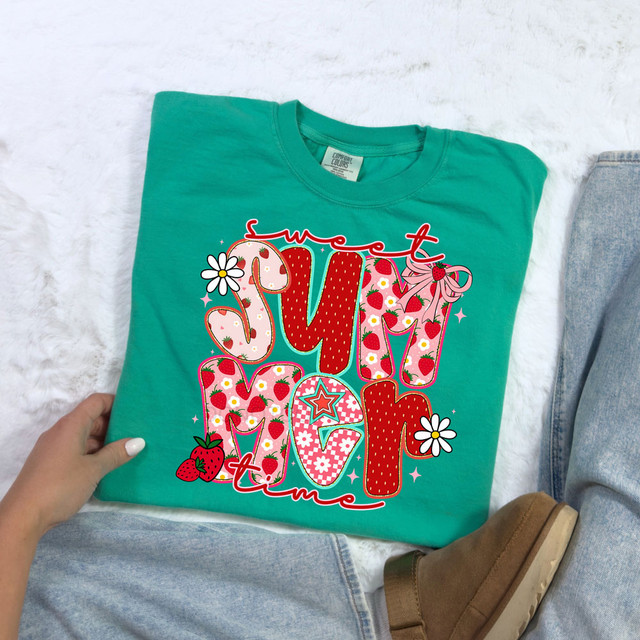Sweet Summertime Strawberries DTF Heat Transfer, colorful strawberry-themed design on a turquoise T-shirt.