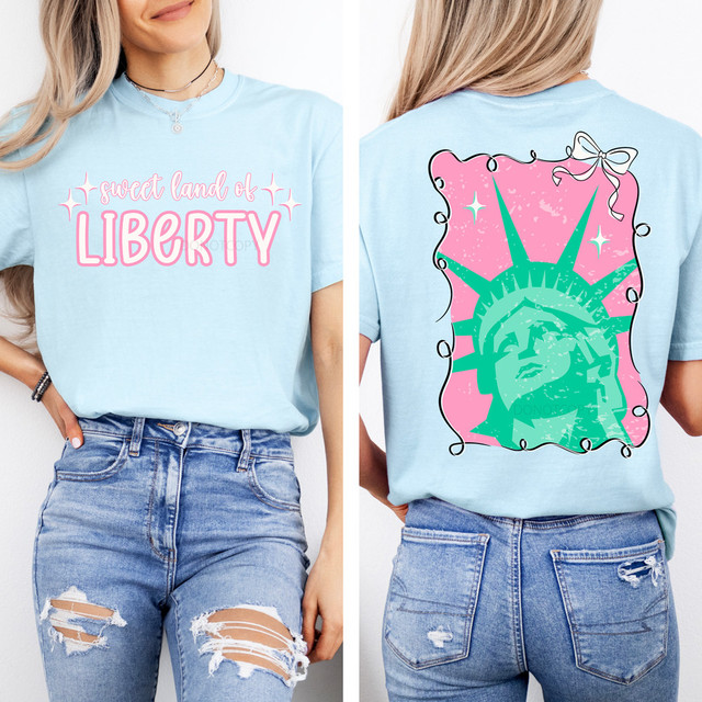 Sweet Land Of Liberty FULL SET DTF Heat Transfer, pink and teal American flag-themed design with the Statue of Liberty on a light blue t-shirt.