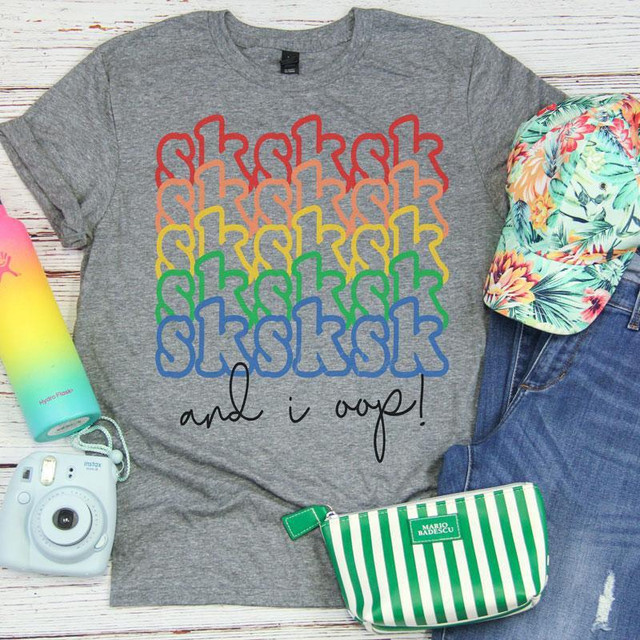 Product SKSKSK, I Oop Screen Print Heat Transfer on a gray T-shirt with colorful text design.