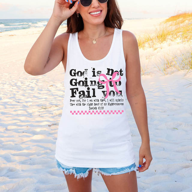 God Is Not Going To Fail You DTF Heat Transfer, a woman on the beach wearing a white tank top with the inspirational Christian message and pink ribbon design.