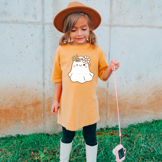 Retro Ghost With Flower Crown DTF Heat Transfer, product featuring a cute ghost with a flower crown design on a girl's yellow t-shirt.