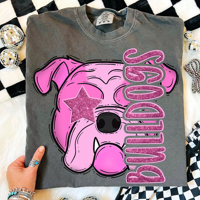 Pink Glitz Mascot DTF Heat Transfer, a pink dog illustration with a glittery star eye and bold text.