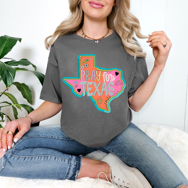 Colorful Pray For Texas DTF Heat Transfer, vibrant and cheerful design on a gray t-shirt with Texas-shaped graphic featuring floral and desert motifs, perfect for fans of Texas and custom heat transfer apparel.