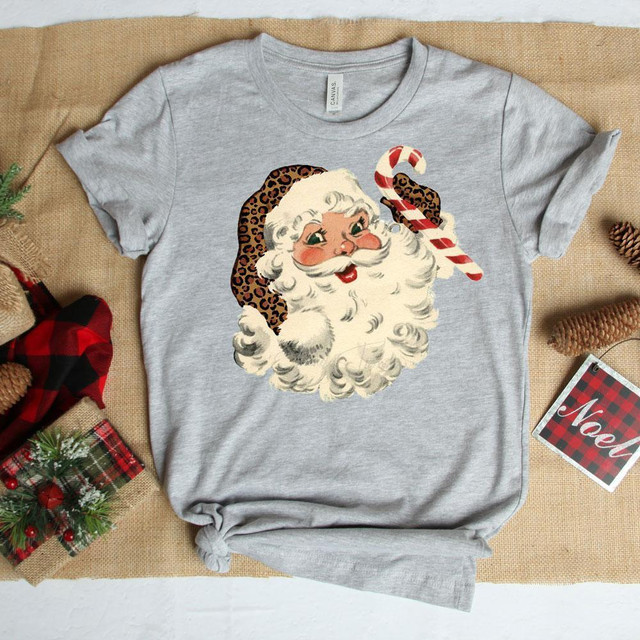 Vintage Santa with Leopard Hat Youth Screen Print Heat Transfer, Christmas graphic T-shirt with Santa holding a candy cane and wearing a leopard print hat on a grey shirt.