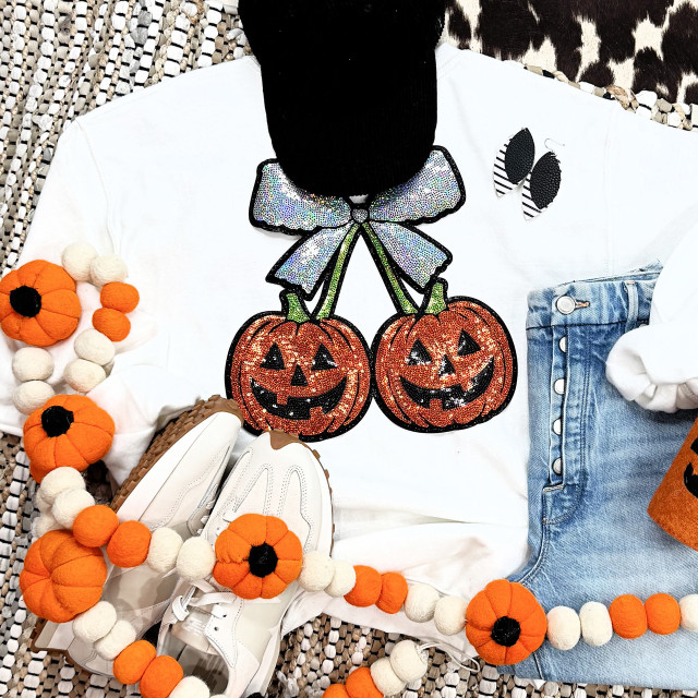 Sequin Double Pumpkin with Bow Patch, festive Halloween-themed clothing and accessories featuring pumpkins, bows, and fall colors.
