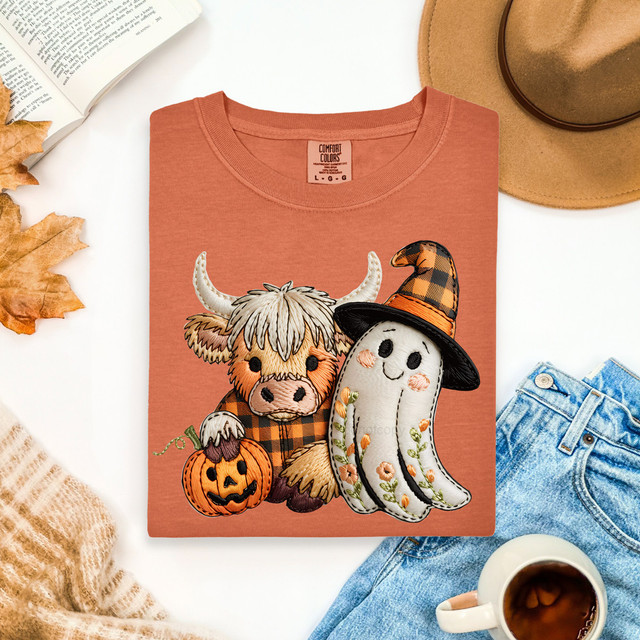 Cow With Ghost Faux Embroidery DTF Heat Transfer, Halloween-themed embroidered design featuring a cute cow in plaid, a ghost with a witch hat, and a pumpkin, on a pink T-shirt.