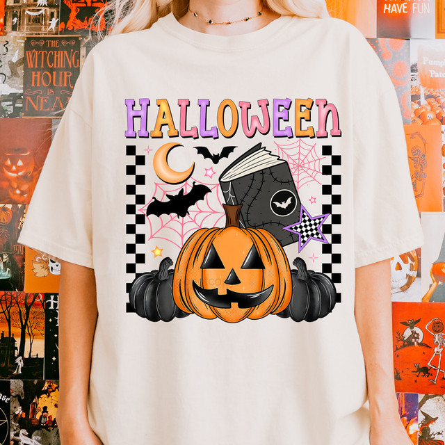 Retro Halloween DTF Heat Transfer, Halloween-themed graphic featuring a Jack-o'-lantern, black pumpkins, a spooky book, bats, a crescent moon, and spiderwebs on a white T-shirt.
